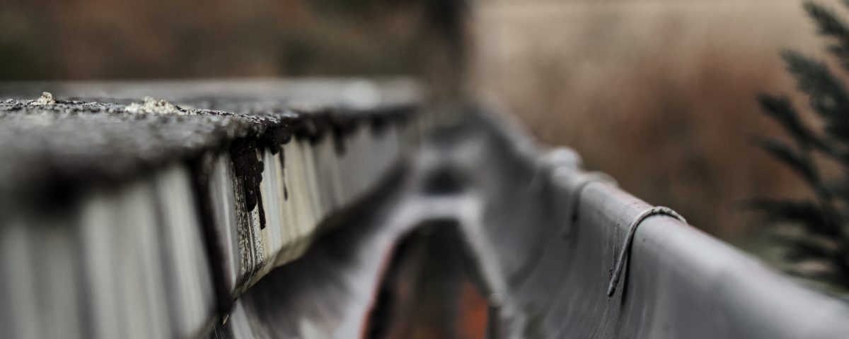 close-up-railing-canal-against-building