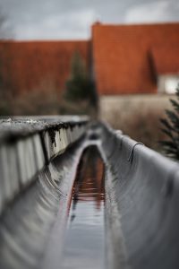 close-up-railing-canal-against-building